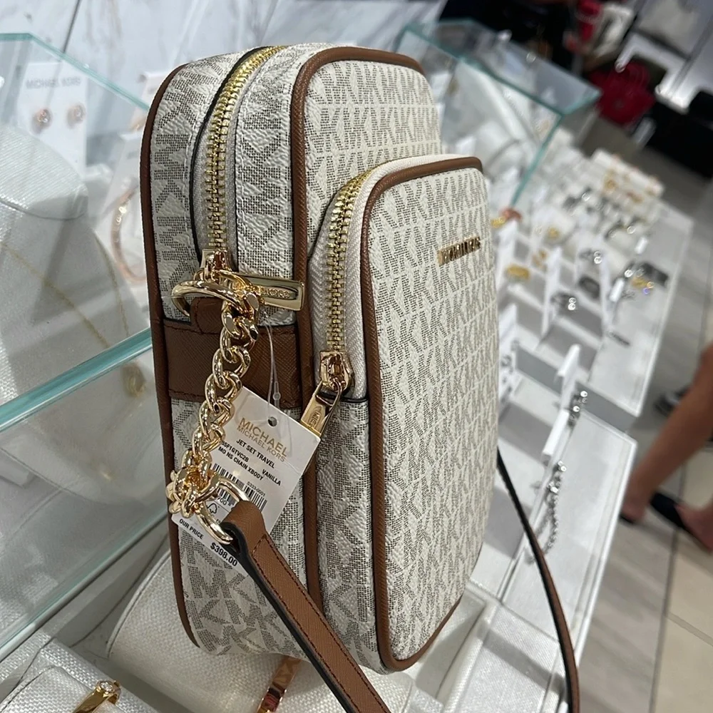 MICHAEL KORS Jet Set Travel Md NS Logo Crossbody Flight Bag Messenge Vanilla NWT